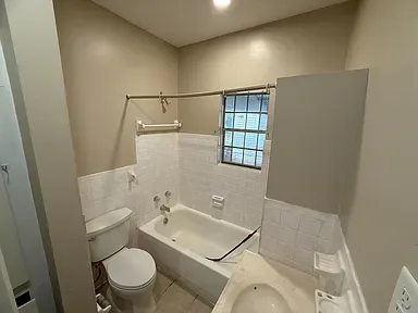 Remodeled bathroom with refinished tub and tile surround after renovation, The Ridgecrest Remodel, Ridgecrest / Southern Meadows, Montgomery
