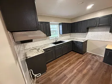 Rebuilt kitchen with expanded cabinets and counters after renovation, The Ridgecrest Remodel, Ridgecrest / Southern Meadows, Montgomery
