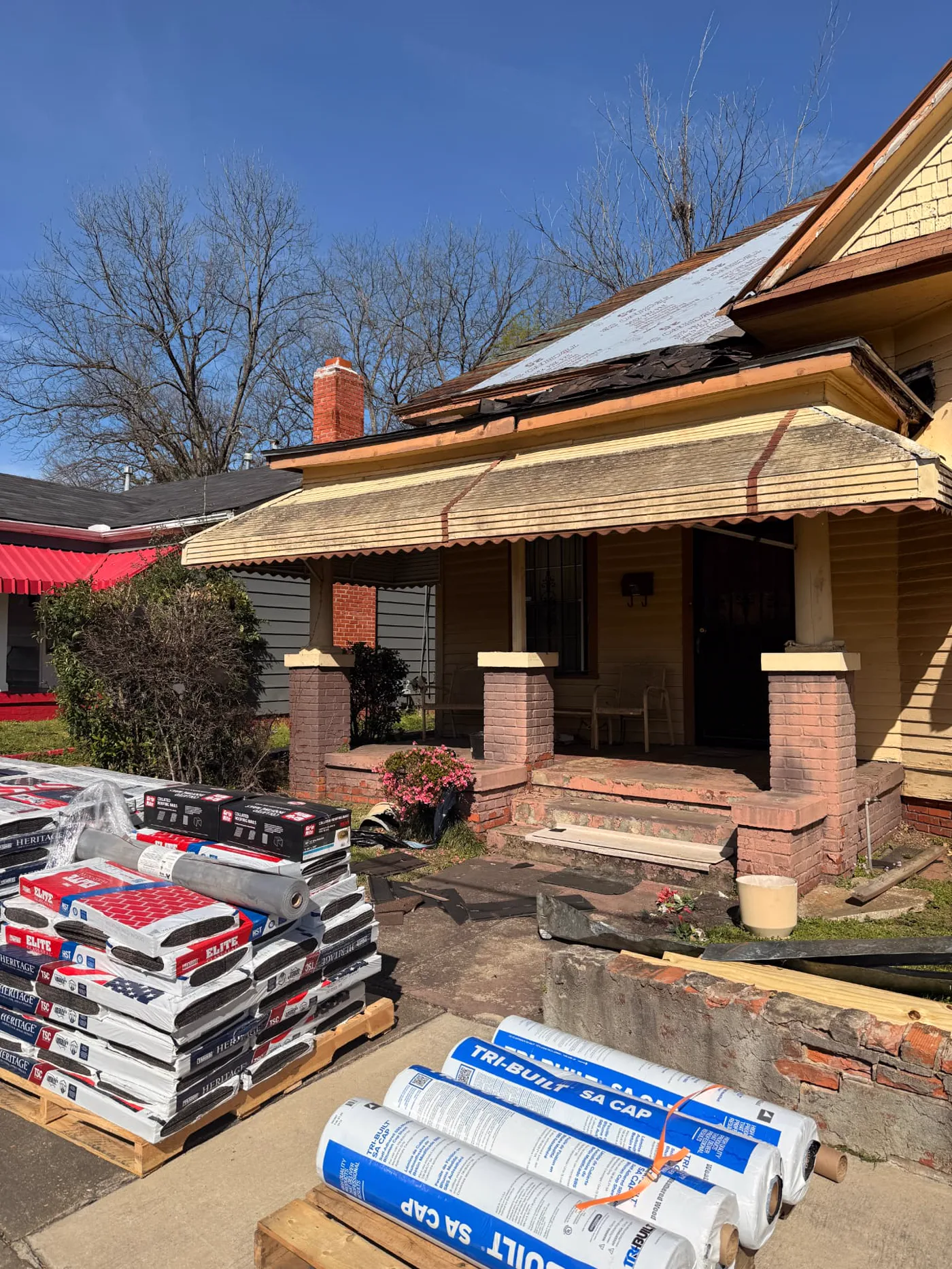 D Nixon Ave exterior and front porch before renovation