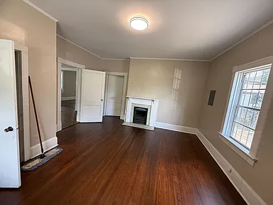 D Nixon Ave finished living room with restored hardwood floors