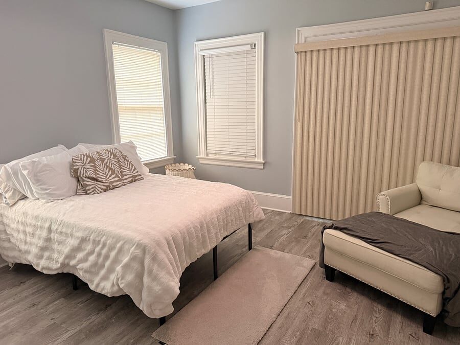 Blue Magnolia bedroom with queen bed and daybed