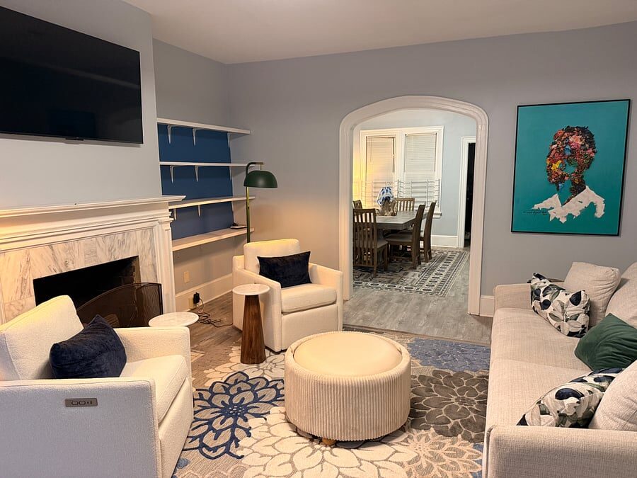 Blue Magnolia living room with fireplace and built-in shelves