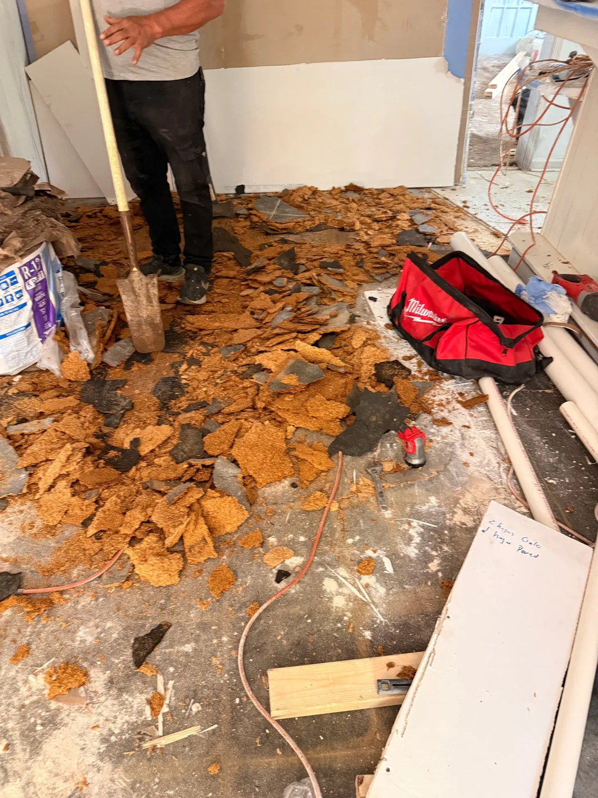 D Nixon Ave flooring demolition in progress before the remodel