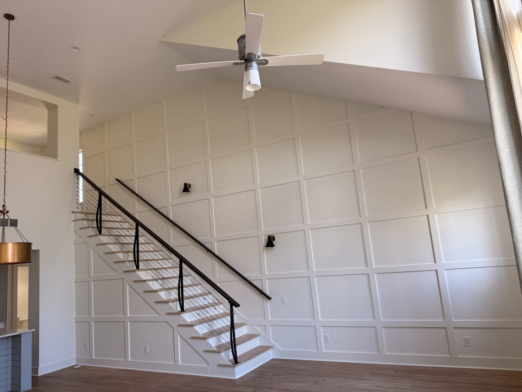 Stair wall paneling after renovation, The Hampstead Townhome, Hampstead, Montgomery